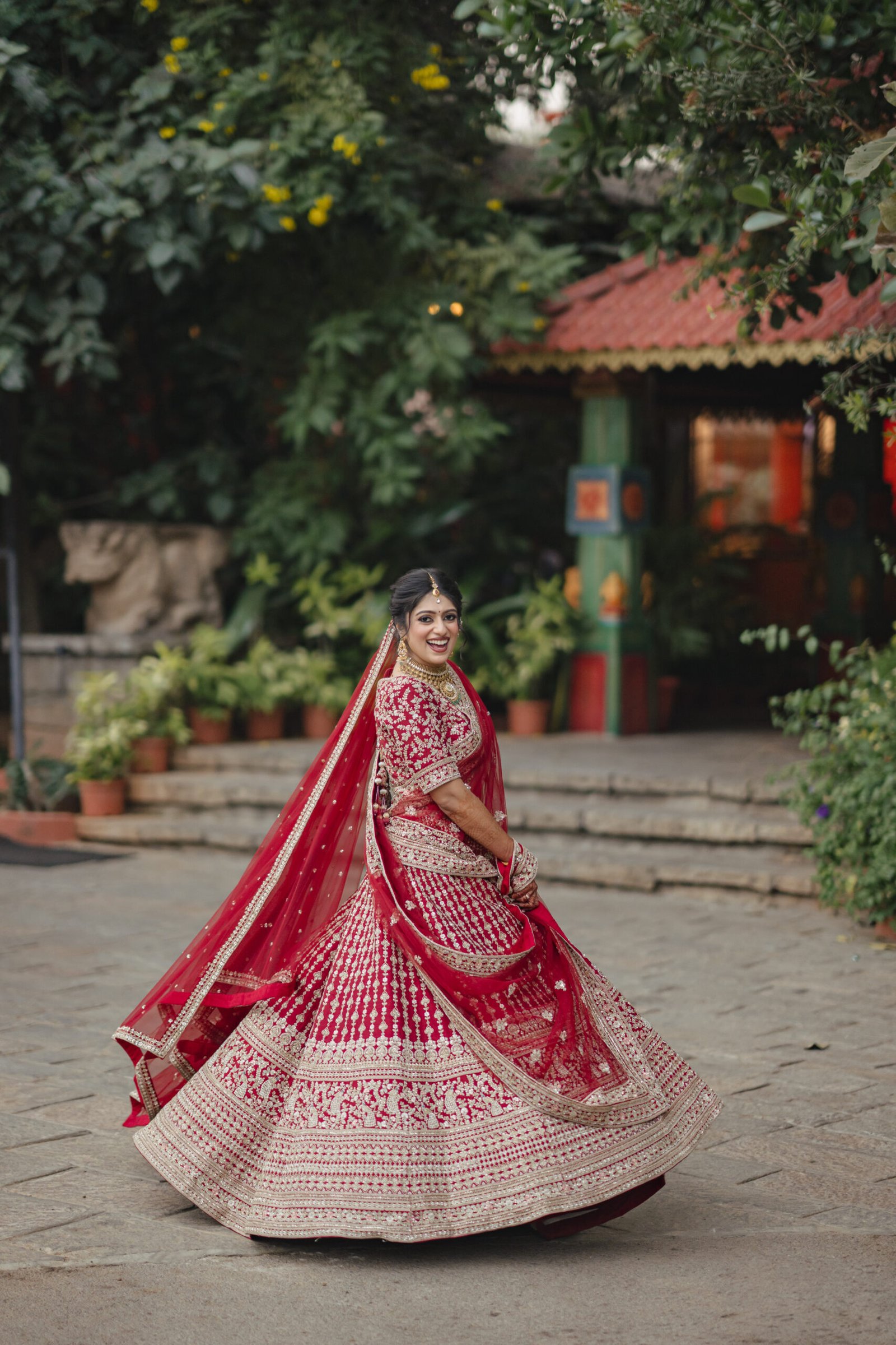 Indian bridal portrait in red lehenga by What A Story Hyderabad