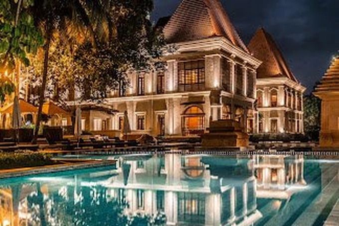 Grand Hyatt Goa luxury wedding venue with illuminated pool and manicured lawns