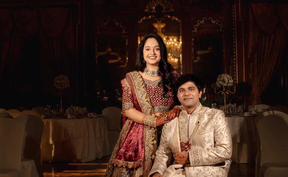 Bride and groom portrait at ITC Kohenur wedding venue with fairy light decor