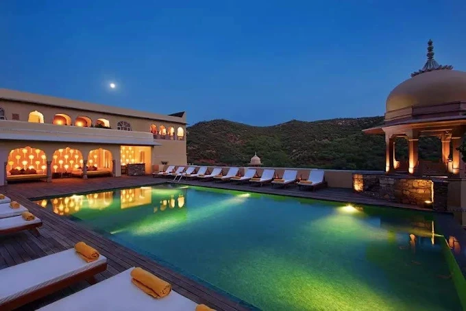 Samode Palace Jaipur hilltop wedding venue illuminated at night