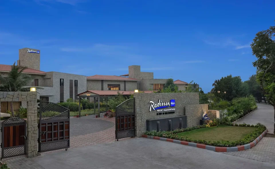 Radisson Blu Resort Visakhapatnam entrance at dusk, with stone sign.