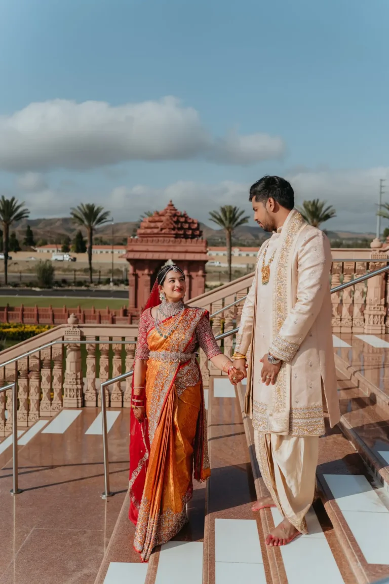 Los Angeles bride & groom on the baps temple steps